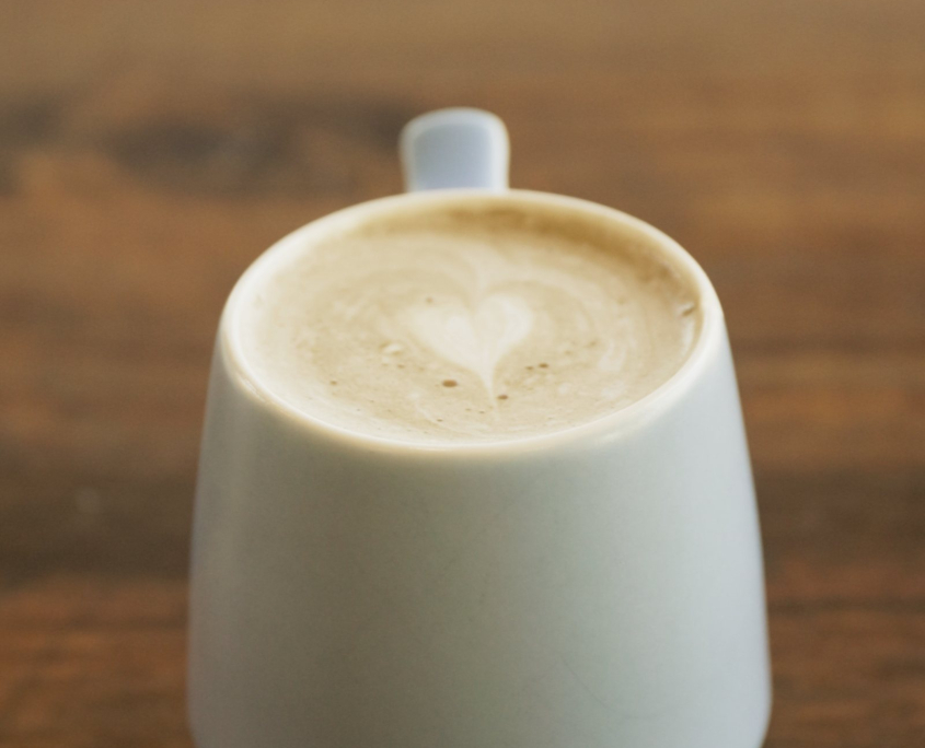 Latte with heart latte art at the Crossroads café